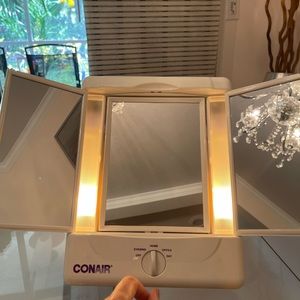 Makeup mirror with different +/-glass.